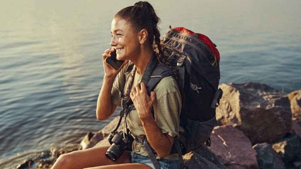 Woman Hiking in the Gulf shores, one of the best things to do in Gulf Shores for nature-lovers